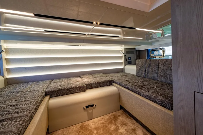 Slide: The Image of Luxurious interior of 2022 Cranchi A46 Luxury Tender with elegant seating and ambient lighting. - 65