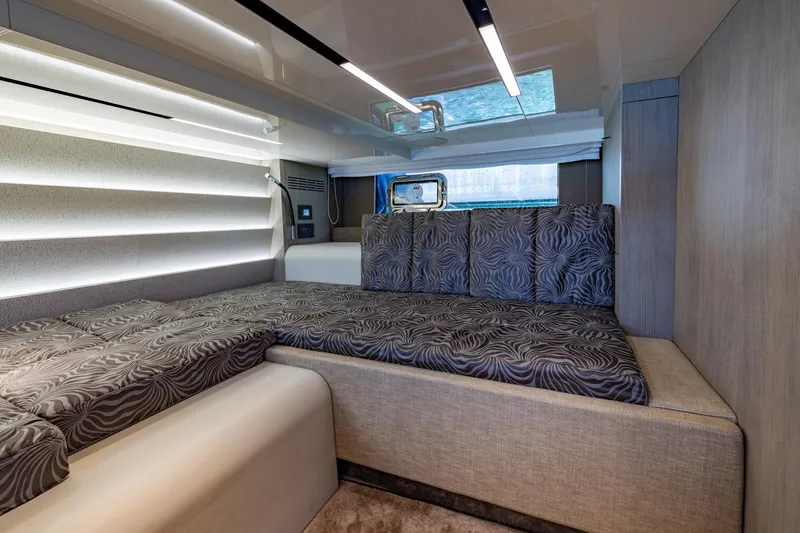 Slide: The Image of Luxurious interior cabin of 2022 Cranchi A46 Luxury Tender with stylish bedding and modern lighting. - 67