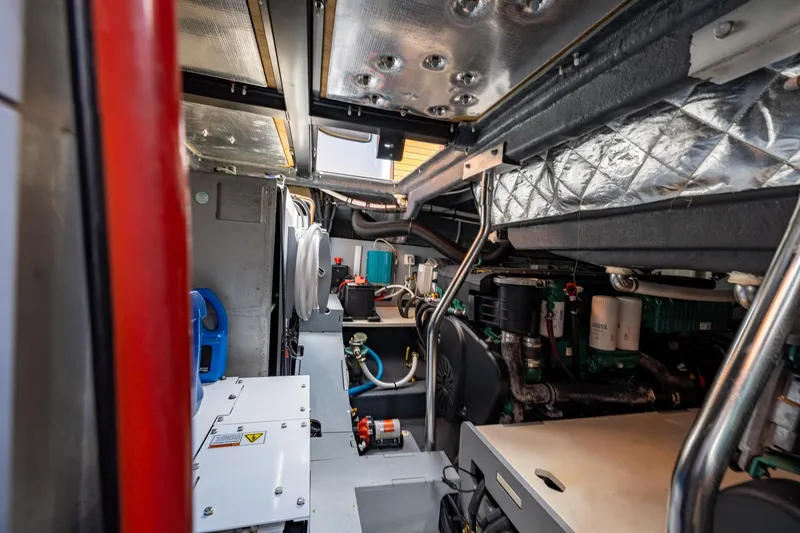 Slide: The Image of Engine room of 2022 Cranchi A46 Luxury Tender, showcasing mechanical components and equipment. - 72