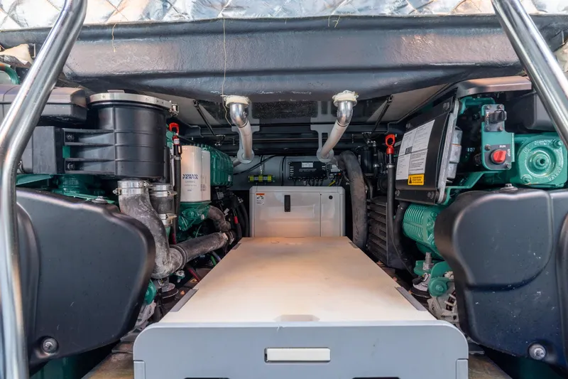 Slide: The Image of Engine compartment of 2022 Cranchi A46 Luxury Tender, showcasing mechanical components and systems. - 78