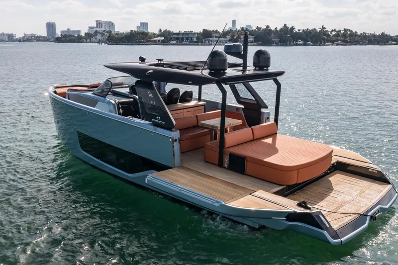 Slide: The Image of 2022 Cranchi A46 Luxury Tender on water, showcasing sleek design and spacious deck. - 8