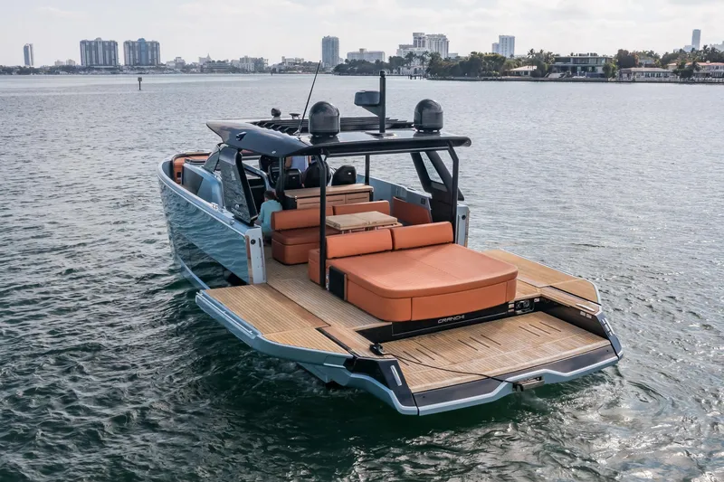 Slide: The Image of 2022 Cranchi A46 Luxury Tender on water, featuring spacious deck and modern design. - 9