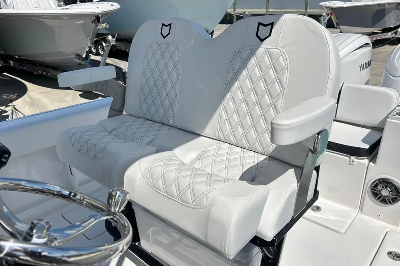Slide: The Image of Luxurious seating on 2026 Sea Fox 268 Commander boat with diamond-stitched upholstery. - 11
