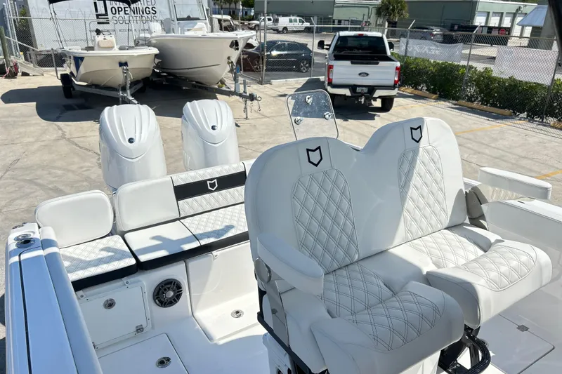 Slide: The Image of 2026 Sea Fox 268 Commander boat interior with dual engines and luxurious seating. - 14