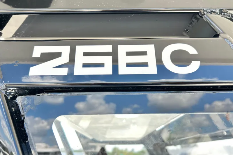 Slide: The Image of Close-up of 2026 Sea Fox 268 Commander boat model number on black surface. - 15