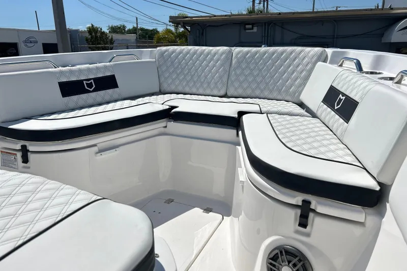 Slide: The Image of Luxurious seating on 2026 Sea Fox 268 Commander boat, featuring quilted upholstery. - 17