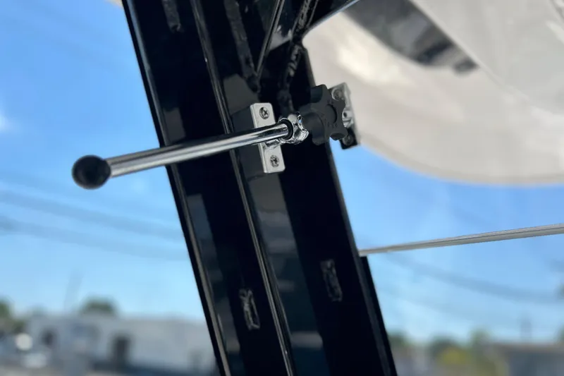 Slide: The Image of Close-up of a 2026 Sea Fox 268 Commander boat component against a clear sky. - 21