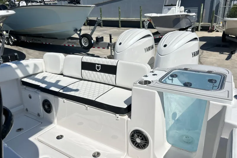 Slide: The Image of 2026 Sea Fox 268 Commander boat interior with Yamaha engines and seating area. - 3
