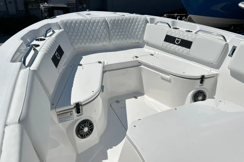 Slide: The Image of 2026 Sea Fox 268 Commander boat interior with cushioned seating and storage compartments. - 36