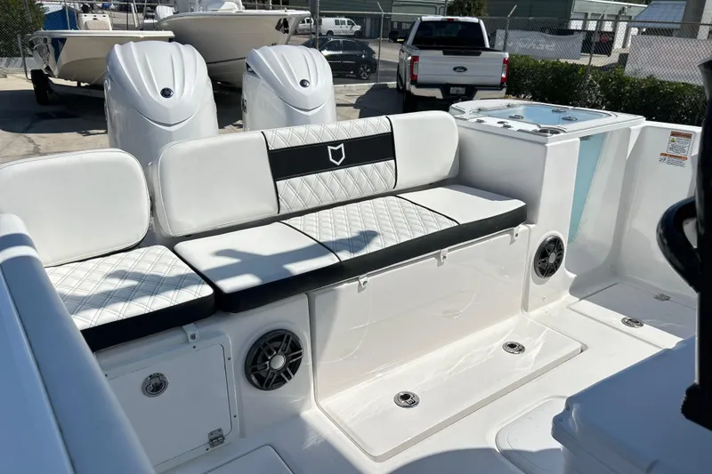 Slide: The Image of 2026 Sea Fox 268 Commander boat interior with white seating and modern design. - 4
