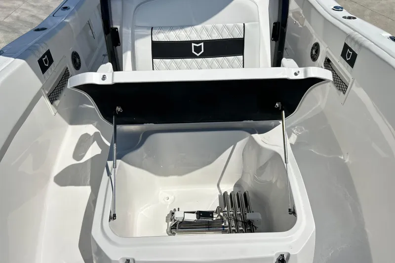 Slide: The Image of 2026 Sea Fox 268 Commander boat storage compartment with open lid and stainless steel fittings. - 41