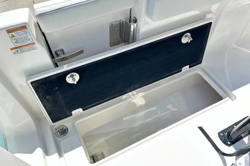 Slide: The Image of Open storage compartment on 2026 Sea Fox 268 Commander boat deck. - 43