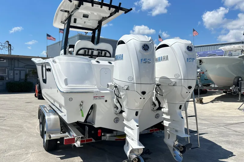 Slide: The Image of 2026 Sea Fox 268 Commander boat with twin Yamaha 150 engines on a trailer. - 44