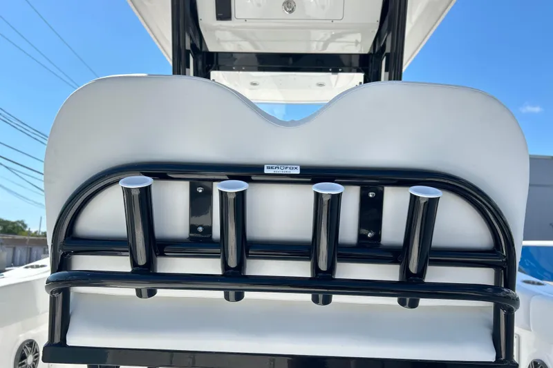 Slide: The Image of 2026 Sea Fox 268 Commander boat rod holders and seating detail. - 7