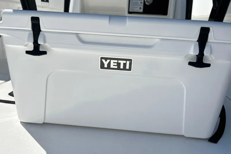 Slide: The Image of White YETI cooler on 2026 Sea Fox 268 Commander boat deck. - 9
