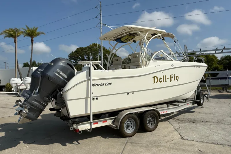 Slide: The Image of 2016 World Cat 255 DC boat on trailer with Yamaha outboard motor. - 7