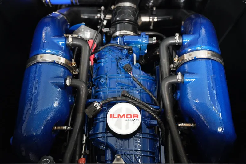 Slide: The Image of Engine of 2025 MasterCraft NXT24 boat, featuring Ilmor 6.0L MPI, blue components. - 14