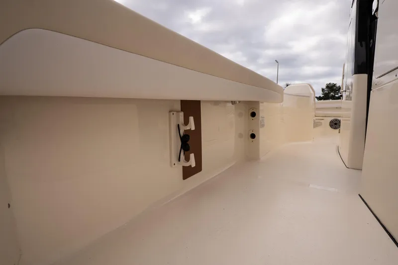 Slide: The Image of 2026 Scout 281 XSS boat interior with beige seating and sleek design. - 20