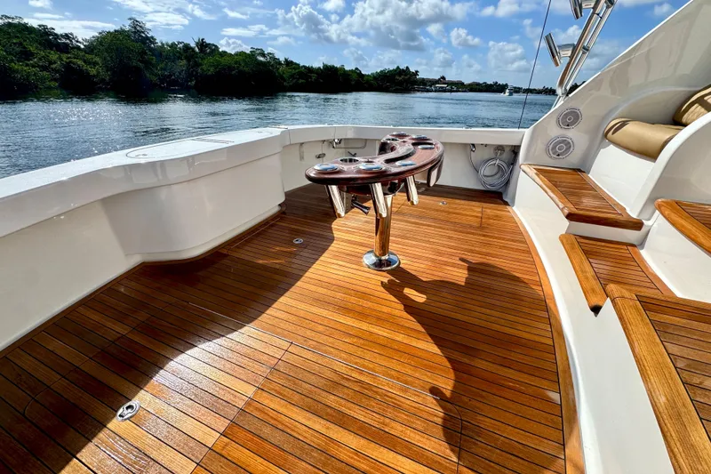 Slide: The Image of Luxurious 2017 Viking 52 Sport Tower yacht deck with polished wood finish. - 22