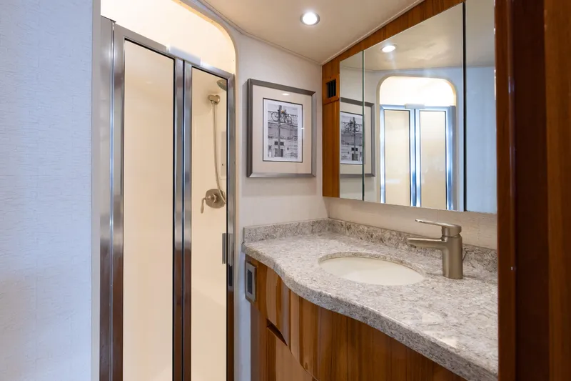 Slide: The Image of Luxurious bathroom in 2017 Viking 52 Sport Tower yacht with modern fixtures and elegant design. - 68