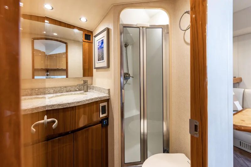 Slide: The Image of Luxurious bathroom interior of 2017 Viking 52 Sport Tower yacht. - 70