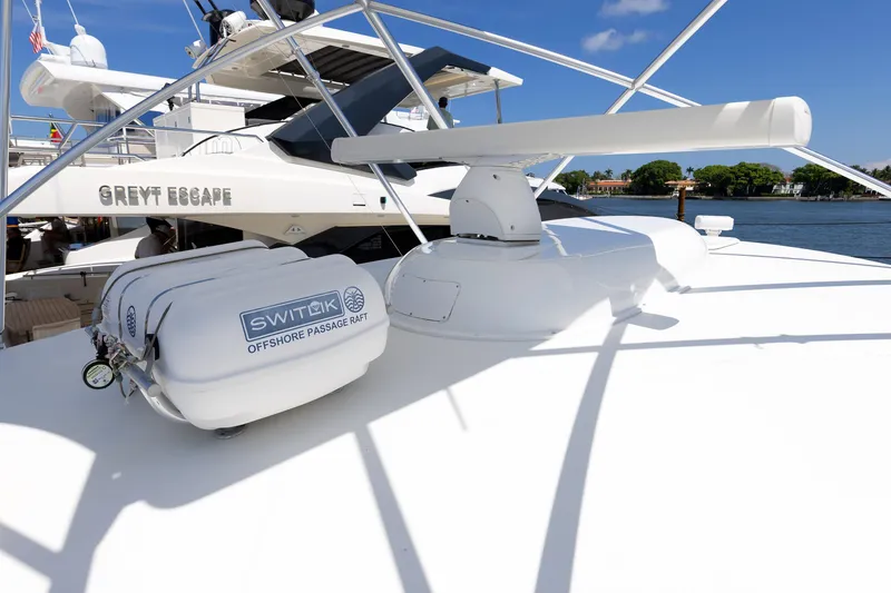 Slide: The Image of 2017 Viking 52 Sport Tower yacht with Switlik offshore passage raft on deck. - 72