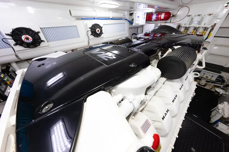Slide: The Image of Engine room of 2017 Viking 52 Sport Tower with MAN engines and ventilation system. - 90