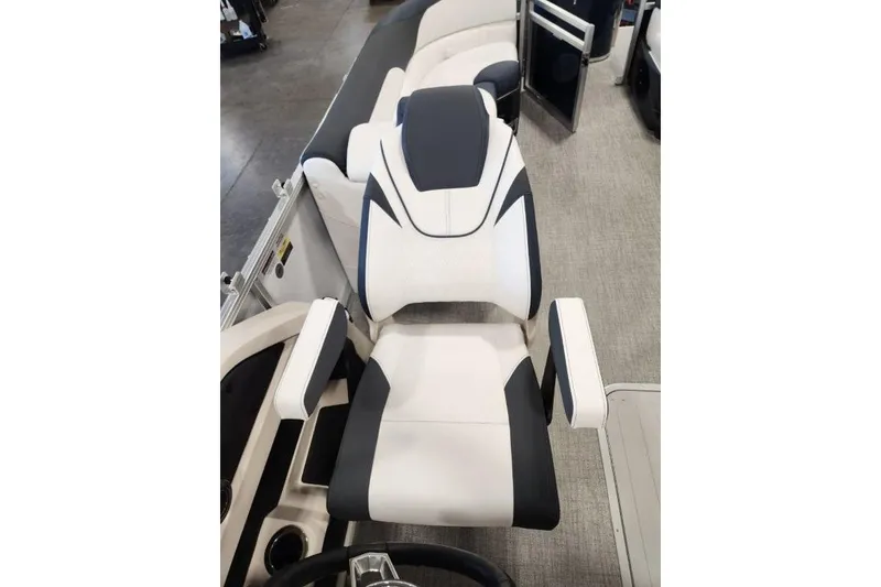 Slide: The Image of Captain's chair on 2026 Tahoe Pontoon LTZ Quad Lounger 23, featuring sleek design and comfortable seating. - 7