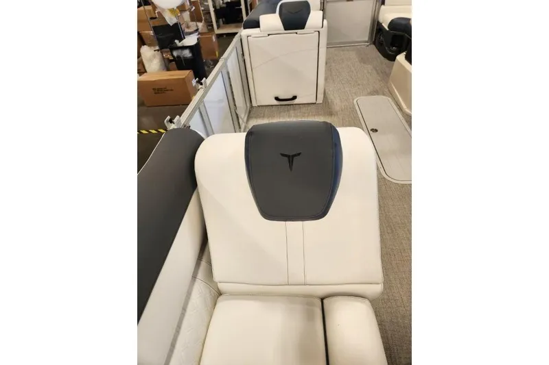 Slide: The Image of 2026 Tahoe Pontoon LTZ Quad Lounger 23 interior with luxurious seating and modern design. - 8