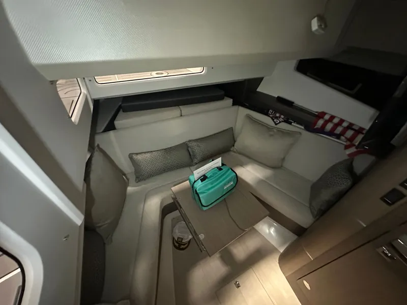 Slide: The Image of Interior of 2024 Galeon 325 GTO featuring cozy seating area. - 12