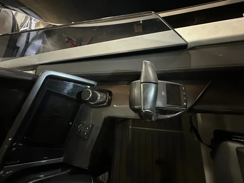 Slide: The Image of Interior view of 2024 Galeon 325 GTO cockpit with control console. - 19