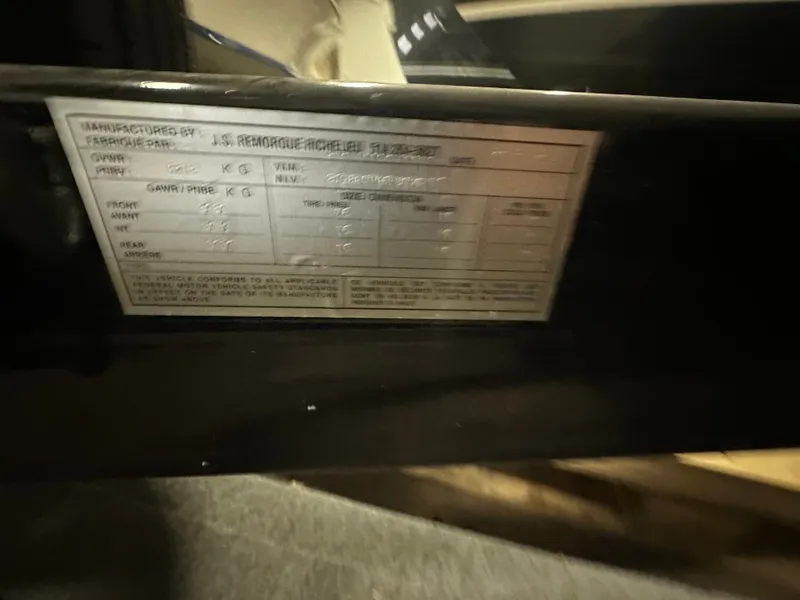 Slide: The Image of Close-up of a manufacturer label on a 2024 Galeon 325 GTO. - 26