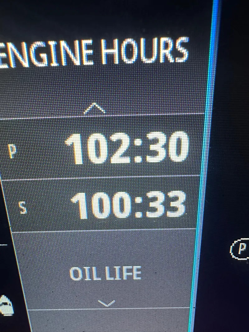 Slide: The Image of Galeon 325 GTO 2024 engine hours display showing 102:30 and 100:33 hours. - 3