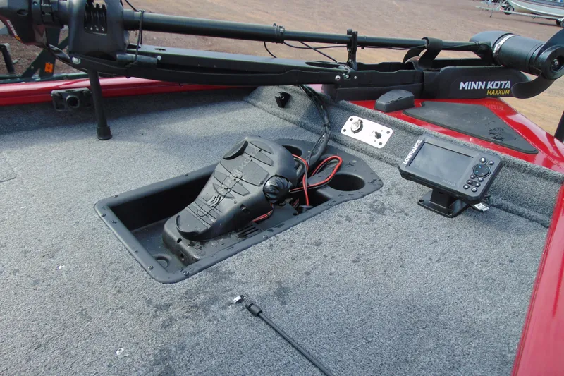 Slide: The Image of 2024 Tracker Pro Team 175 TF boat deck with Minn Kota trolling motor and Lowrance fish finder. - 3