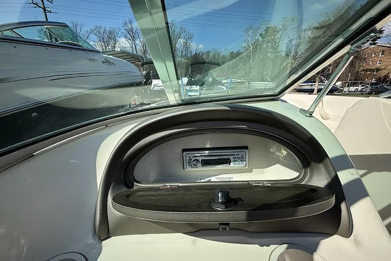 Slide: The Image of Dashboard view of a 2004 Sea Ray 185 Sport boat with stereo system. - 11