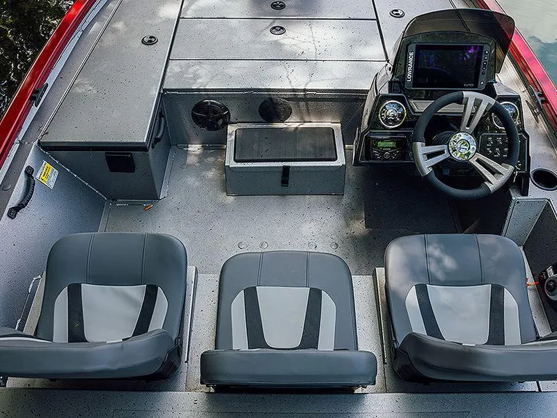 Slide: The Image of Manufacturer Provided Image: 2024 Lowe Stinger 175C boat interior with three seats and control console. - 15