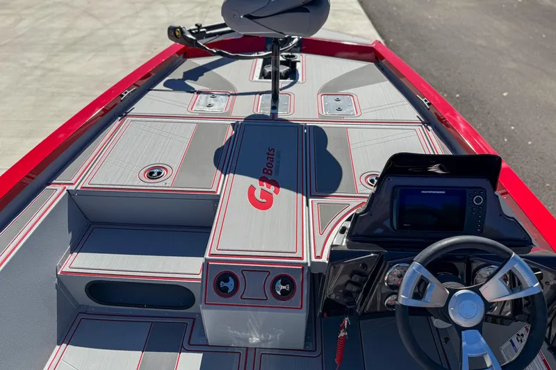 Slide: The Image of 2026 G3 Sportsman 1710 SE boat interior with steering wheel and control panel. - 10