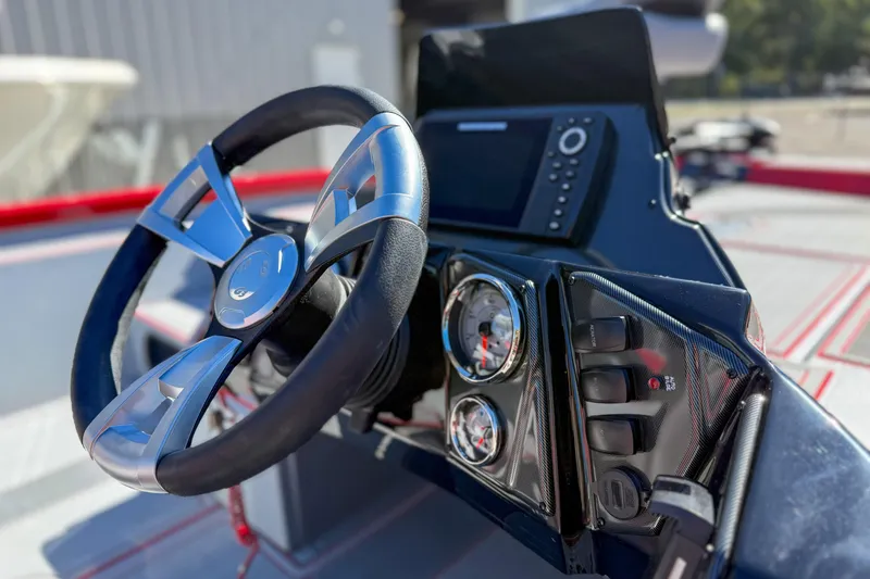 Slide: The Image of 2026 G3 Sportsman 1710 SE boat dashboard with steering wheel and gauges. - 6