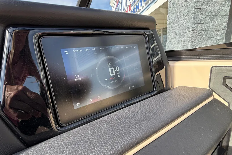 Slide: The Image of Touchscreen dashboard of 2026 ATX Surf Boats 24 Type-S displaying speed and settings. - 13