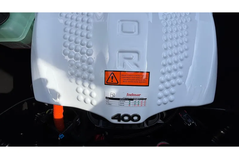 Slide: The Image of Engine cover of 2026 ATX Surf Boats 24 Type-S with Indmar branding. - 18