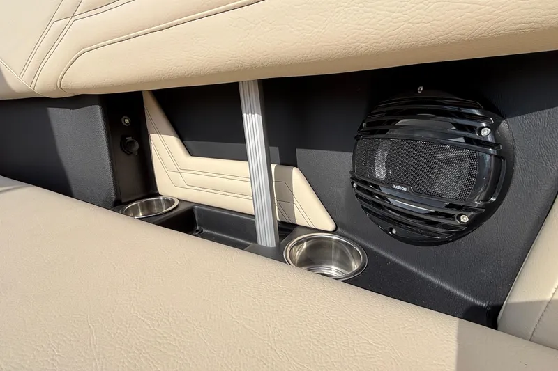 Slide: The Image of Interior of 2026 ATX Surf Boats 24 Type-S with speaker and cup holders. - 25