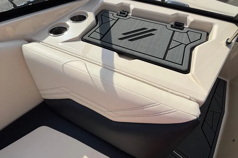 Slide: The Image of Interior of 2026 ATX Surf Boats 24 Type-S with cup holders and storage compartment. - 27
