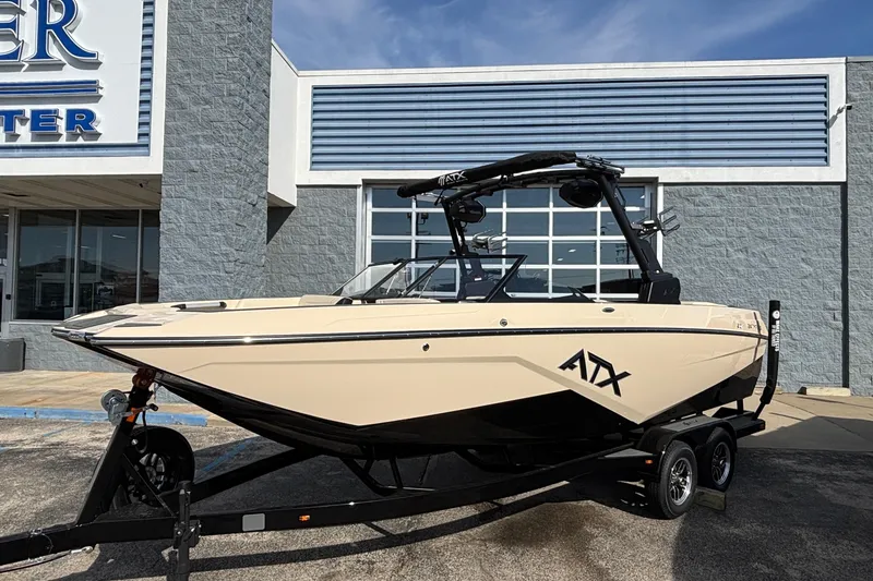 Slide: The Image of 2026 ATX Surf Boats 24 Type-S displayed outside dealership. - 3
