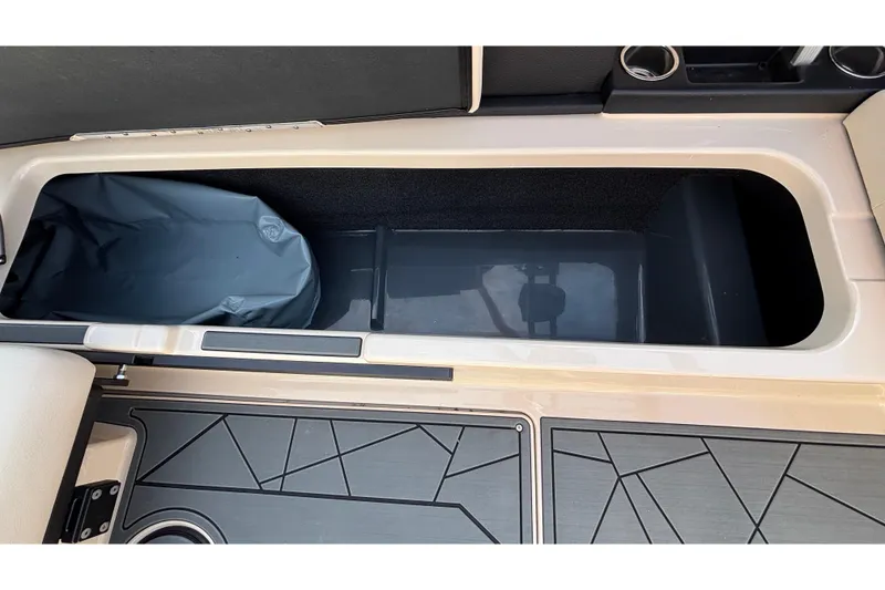 Slide: The Image of 2026 ATX Surf Boats 24 Type-S storage compartment with sleek interior design. - 31