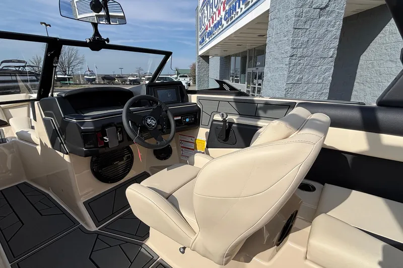Slide: The Image of Interior of 2026 ATX Surf Boats 24 Type-S, featuring modern dashboard and steering wheel. - 35