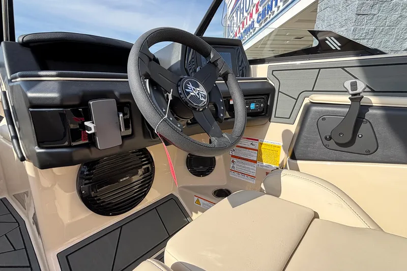 Slide: The Image of Interior view of 2026 ATX Surf Boats 24 Type-S dashboard and steering wheel. - 36