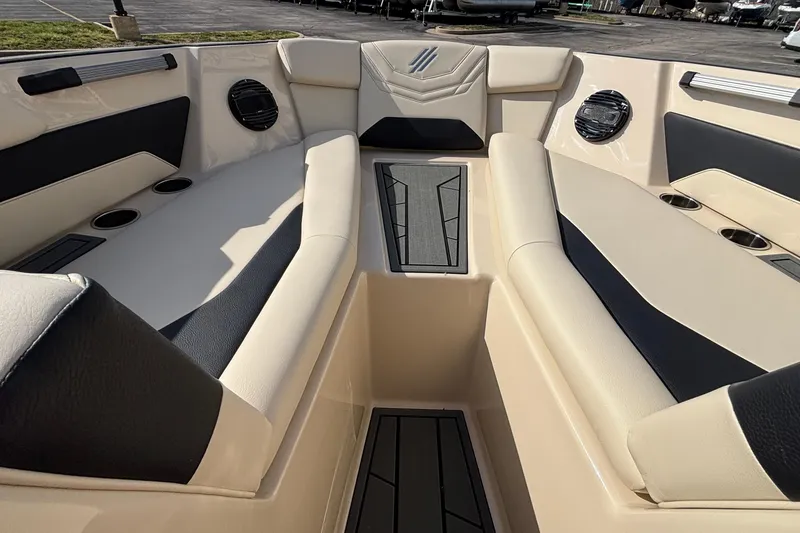Slide: The Image of Luxurious interior of 2026 ATX Surf Boats 24 Type-S with beige and black seating. - 39