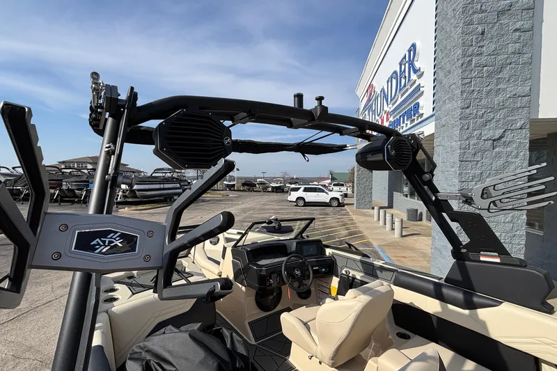 Slide: The Image of 2026 ATX Surf Boats 24 Type-S at dealership, showcasing interior and dashboard features. - 44