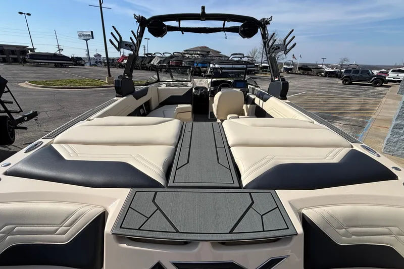 Slide: The Image of 2026 ATX Surf Boats 24 Type-S interior with beige seating and sleek design. - 46