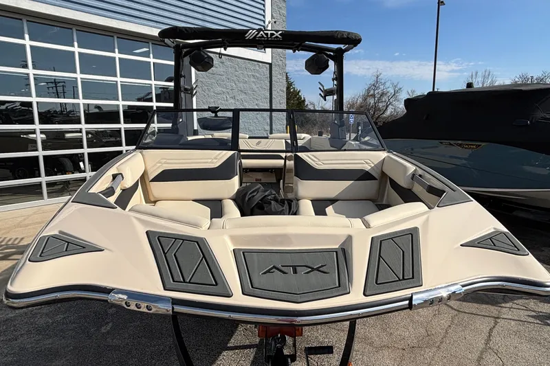 Slide: The Image of 2026 ATX Surf Boats 24 Type-S, beige interior, parked outdoors. - 5